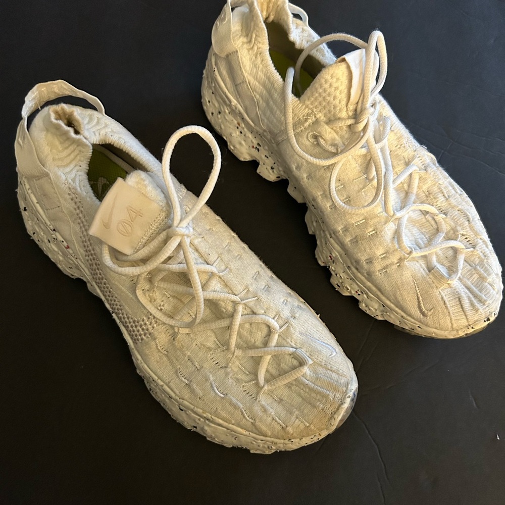 Nike white cloth shoes with stretchable heels, size 6